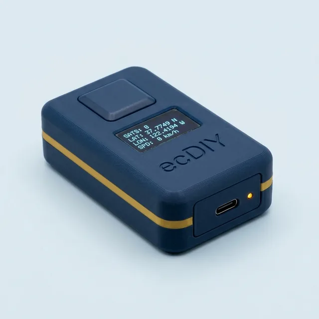 GPS tracker in a navy case with OLED screen showing satellites and coordinates